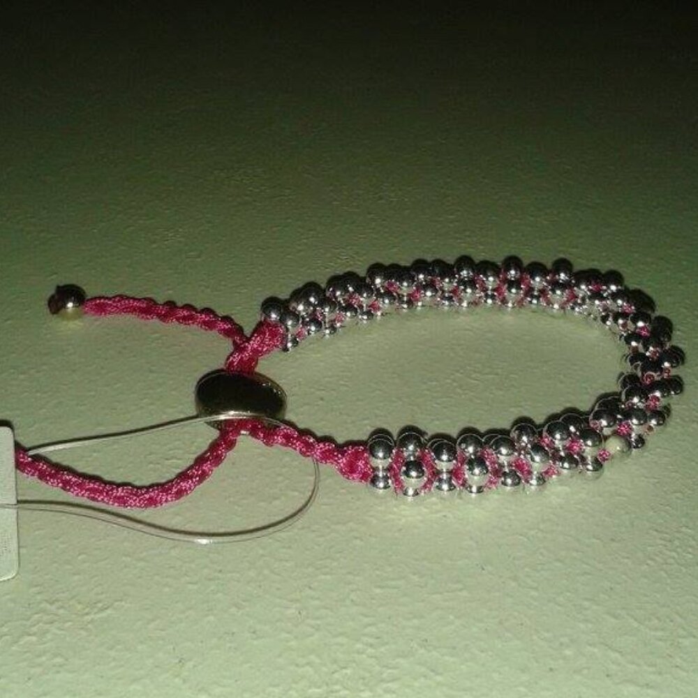 Twisted cord bracelet with silver beads